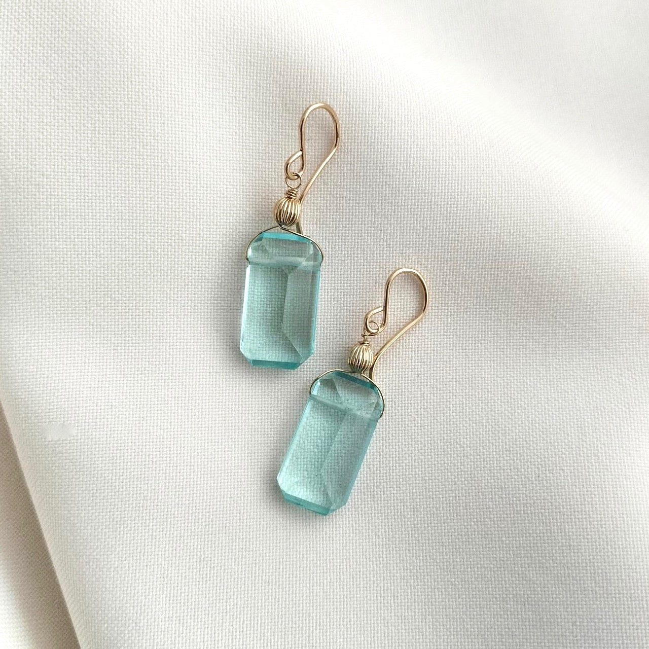 Aquamarine dangly gold earrings