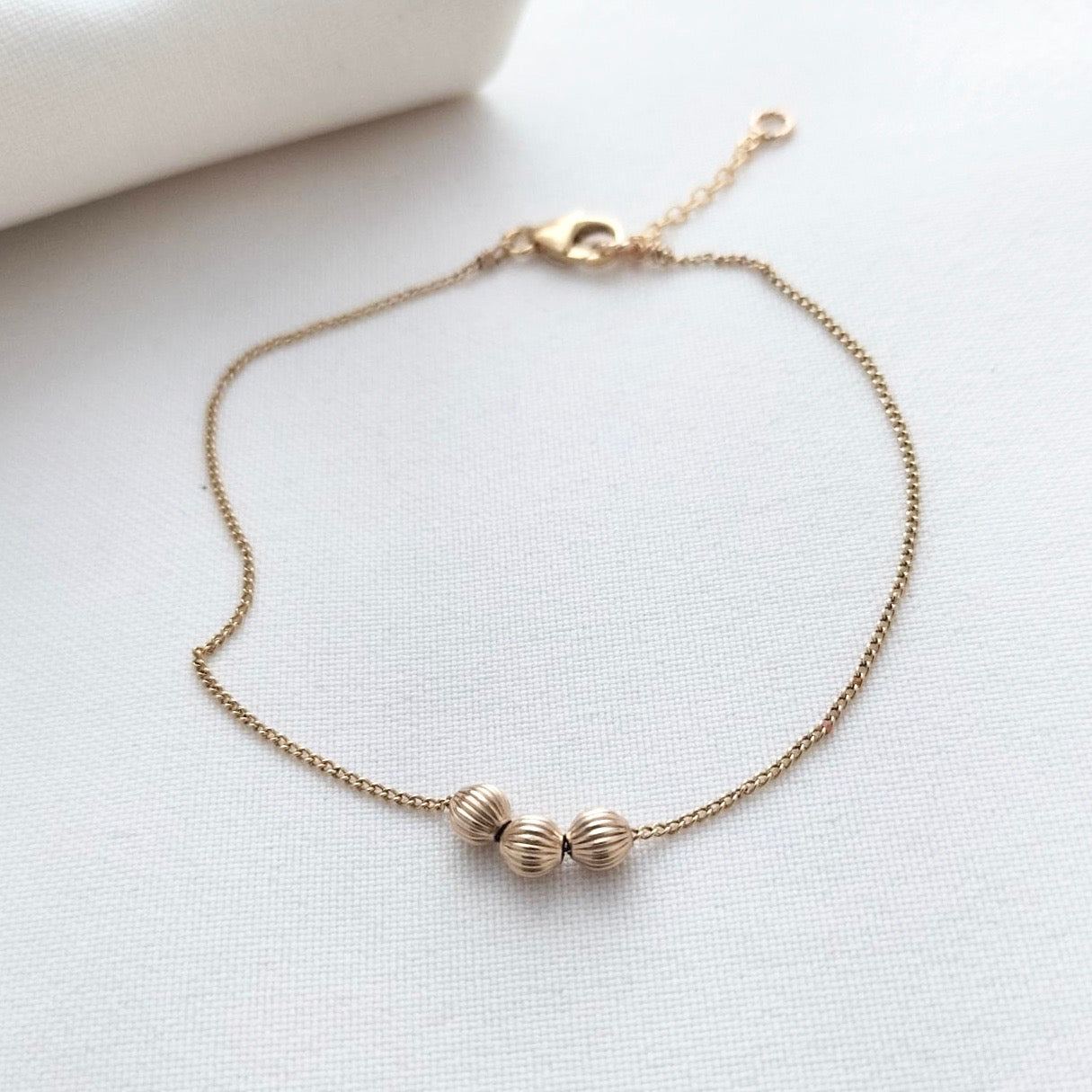 Dainty gold bead bracelet