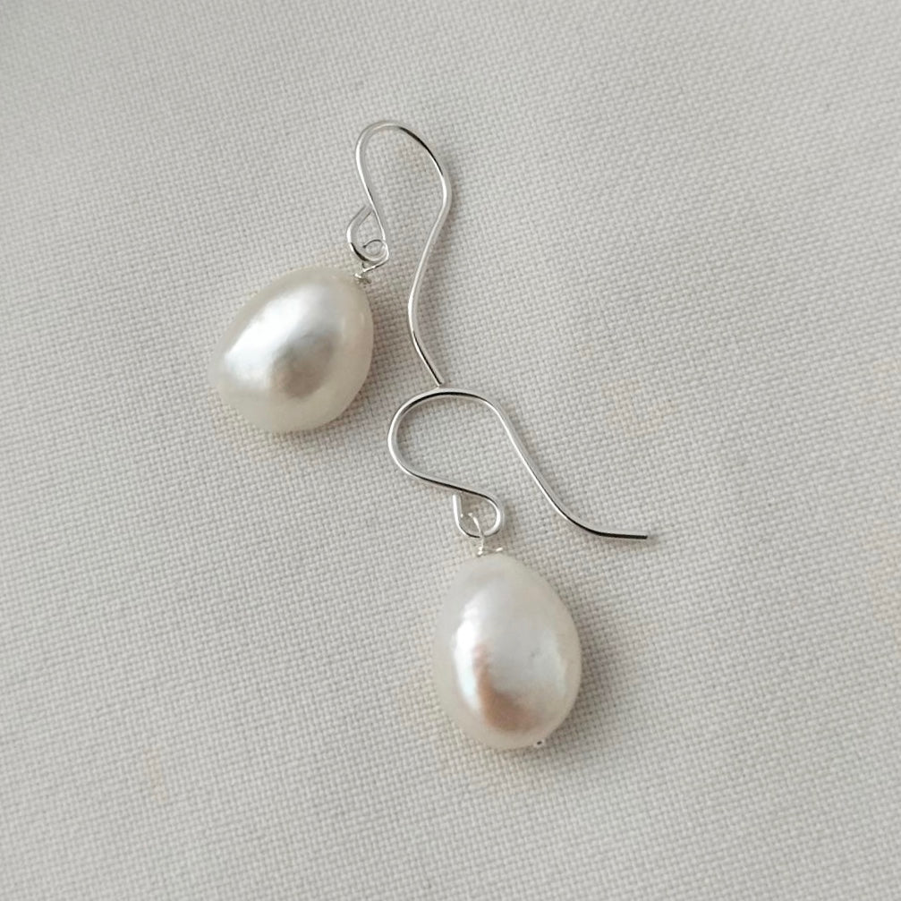 Pearl and silver earrings