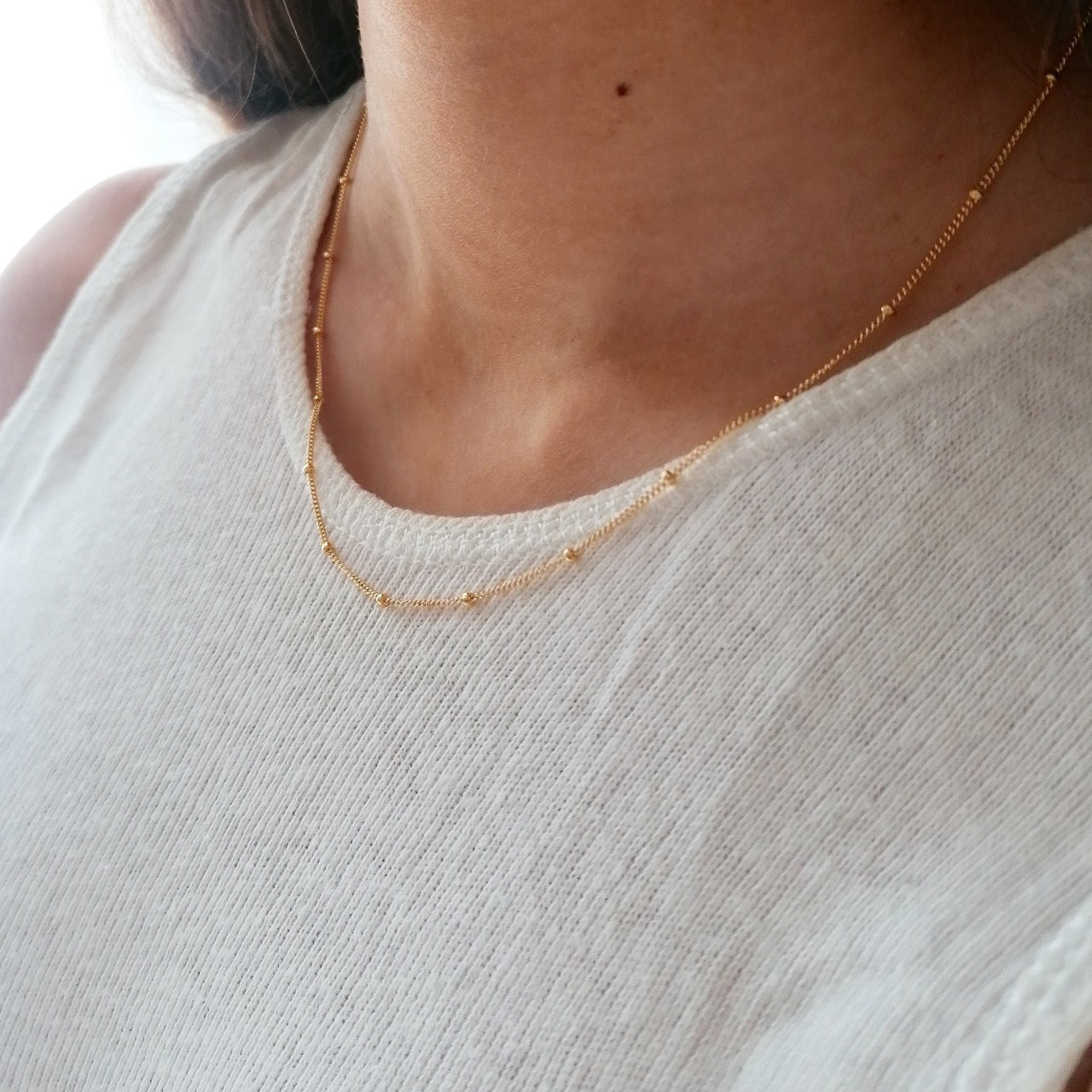 Gold satellite chain