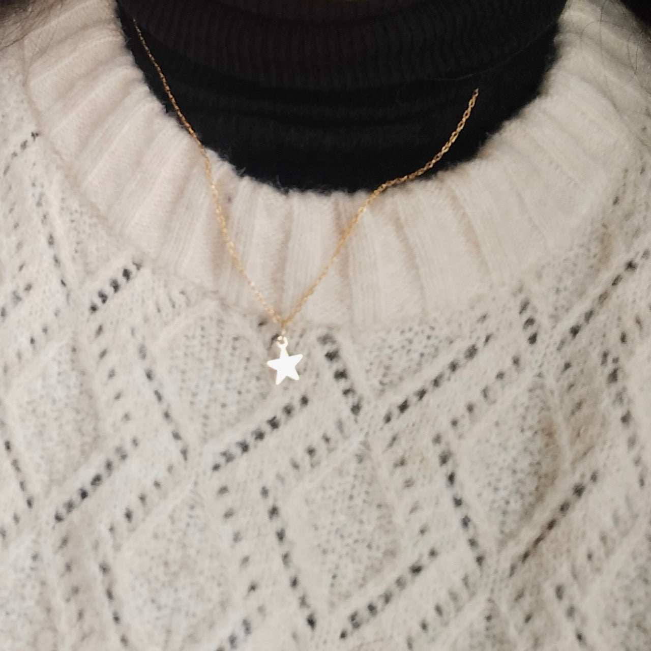 Tiny gold star necklace