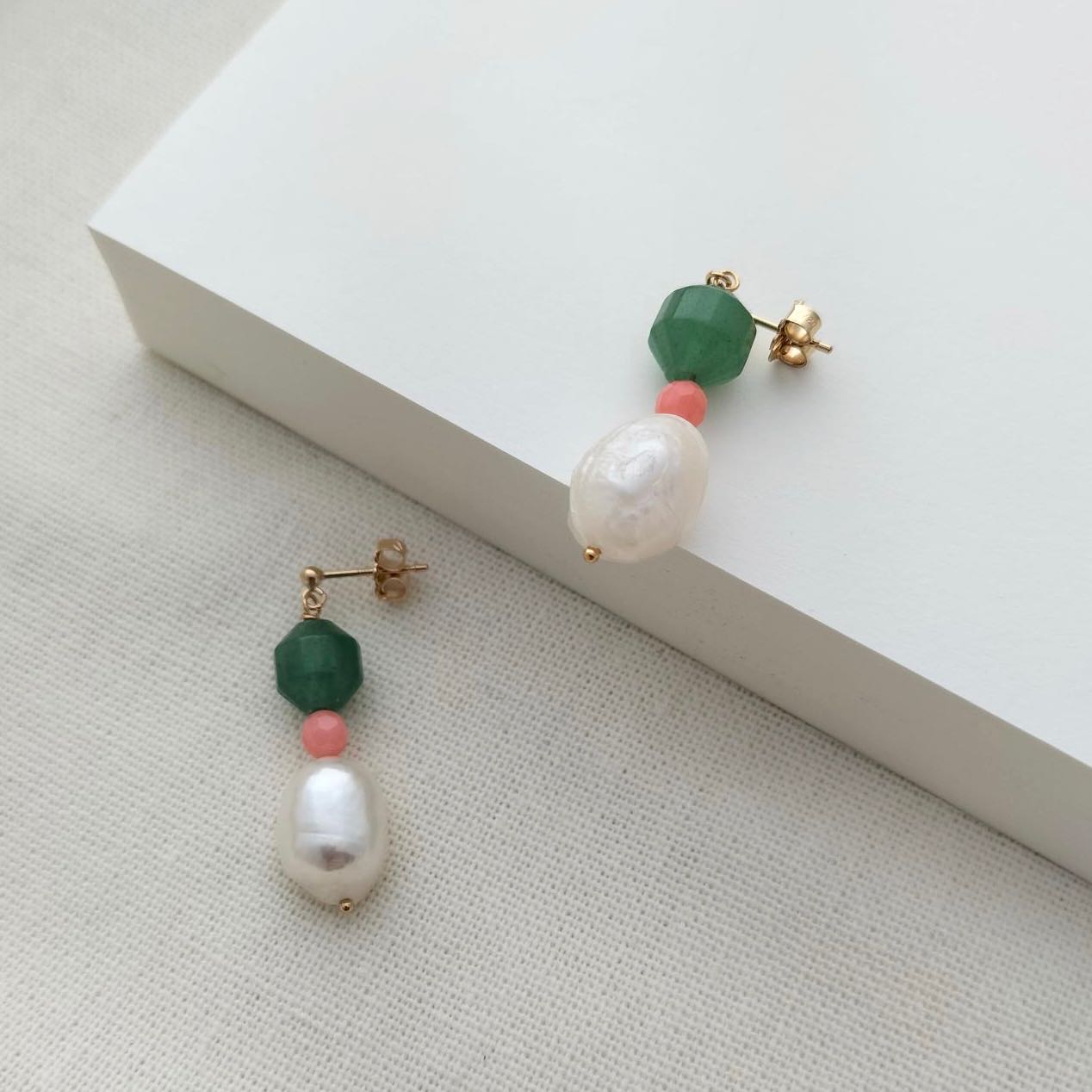 green white and pink earrings
