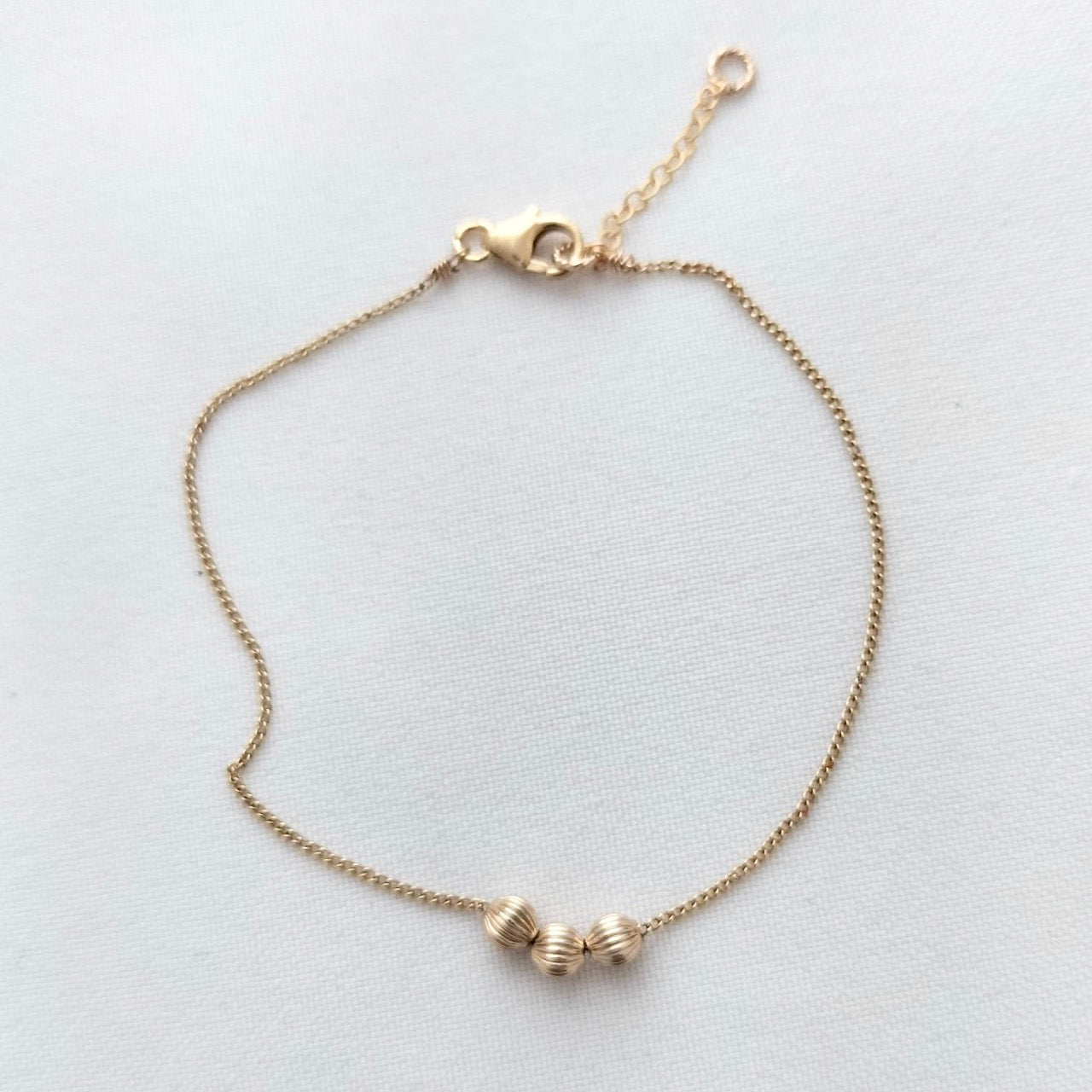 Dainty gold bead bracelet