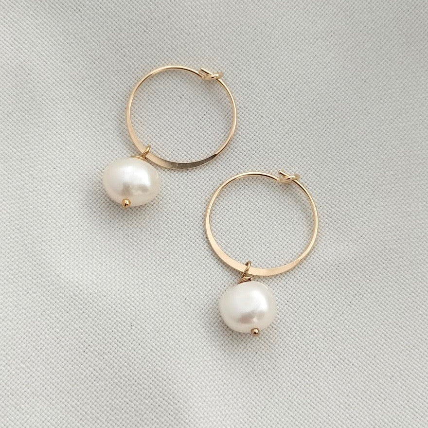 Small gold hoops with pearls