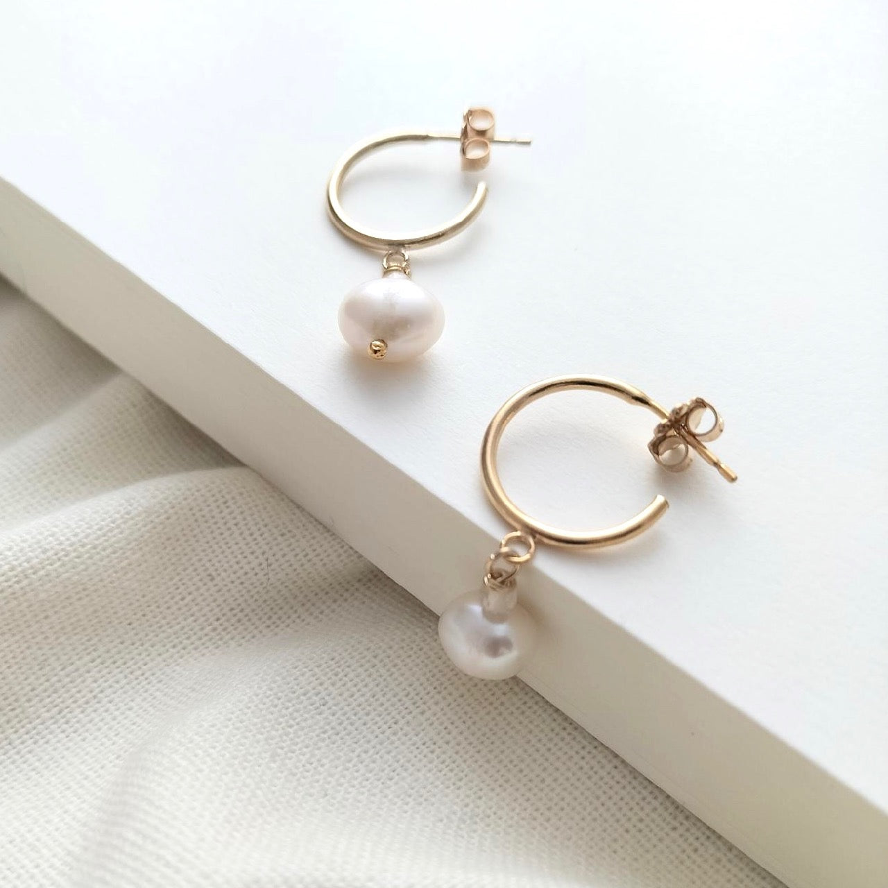 Gold hoops with pearls