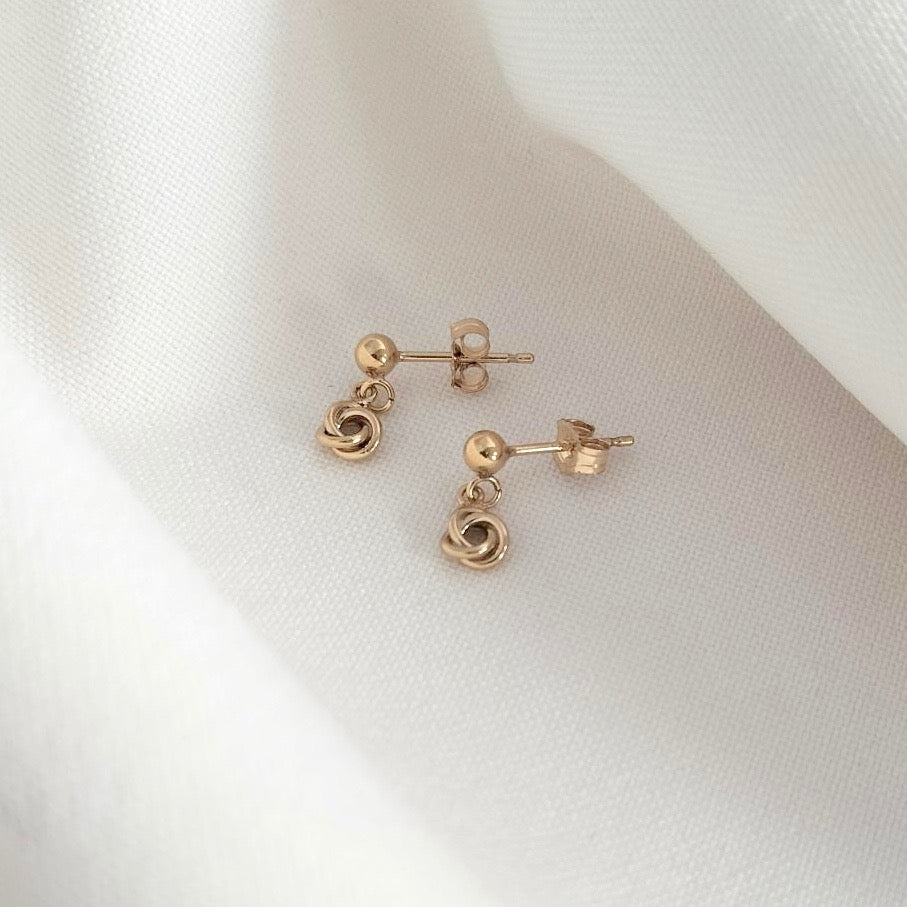 Gold love knot earrings