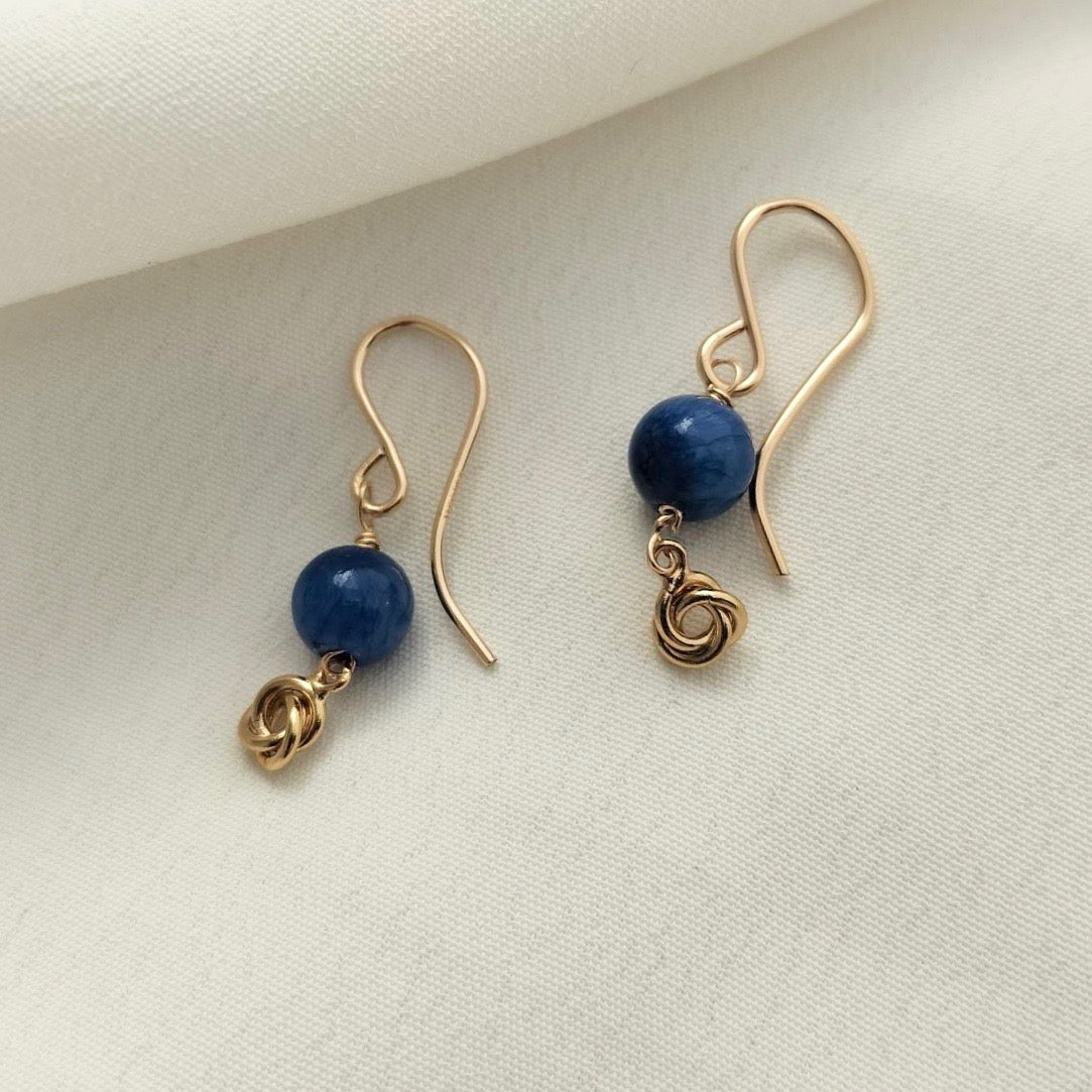 Small knot earrings with blue beads