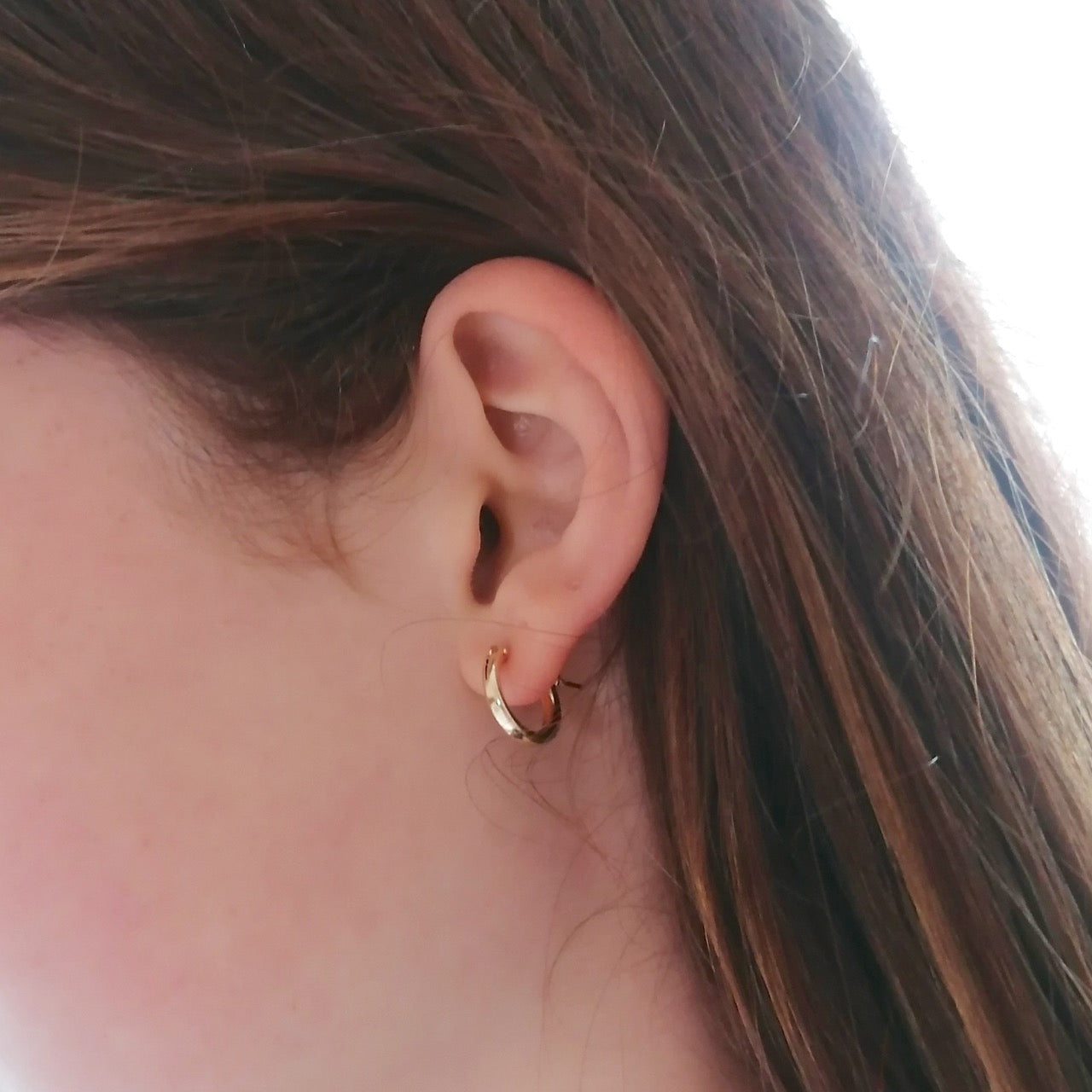 gold hinged ear hugger hoop earrings