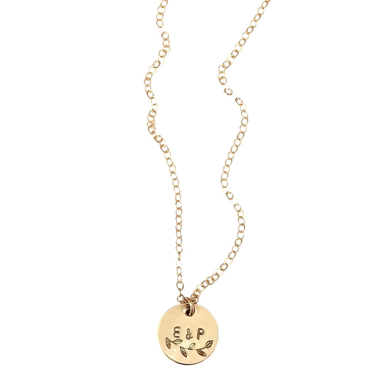 Personalised gold disc necklace with botanical design