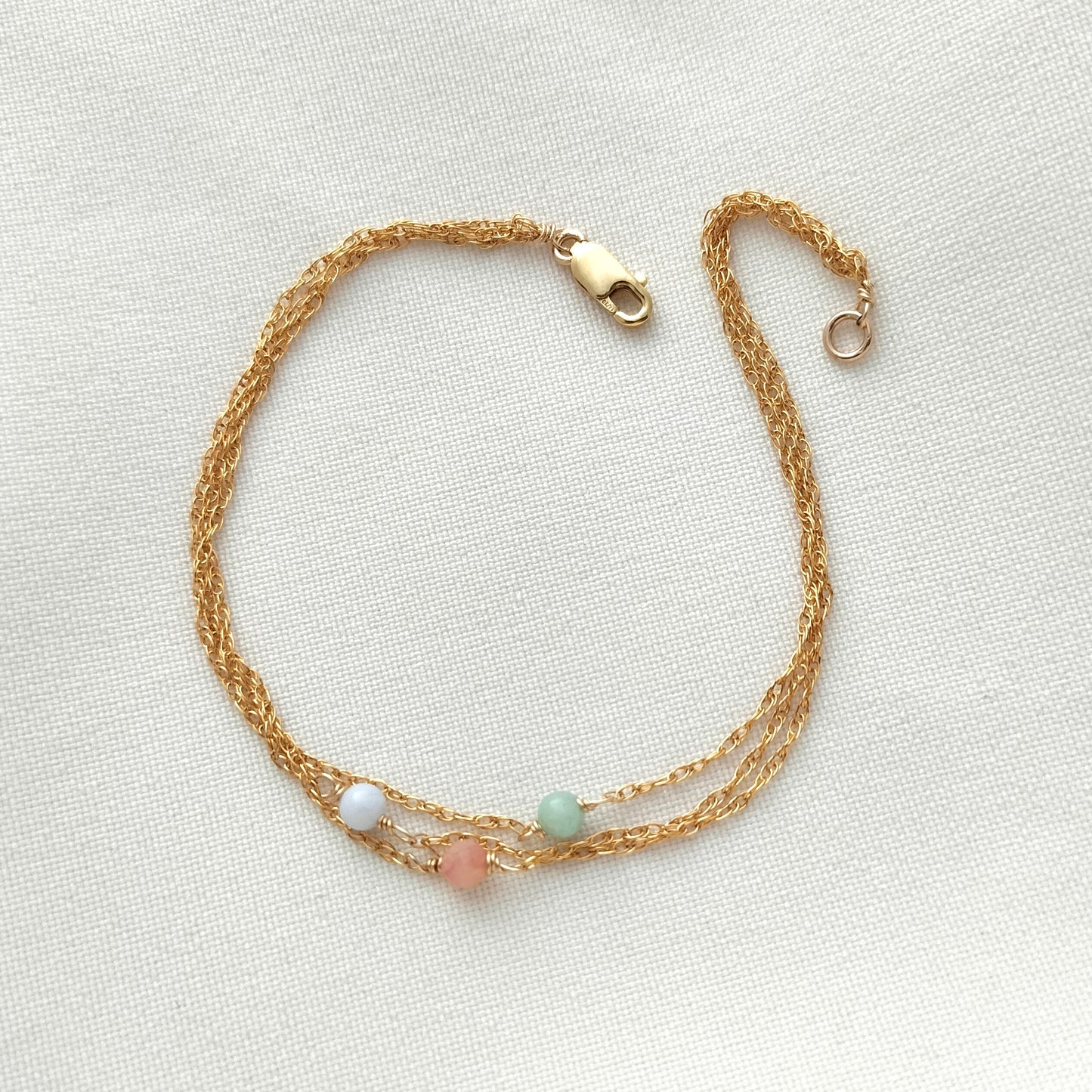 Triple strand pastel gemstone bracelet