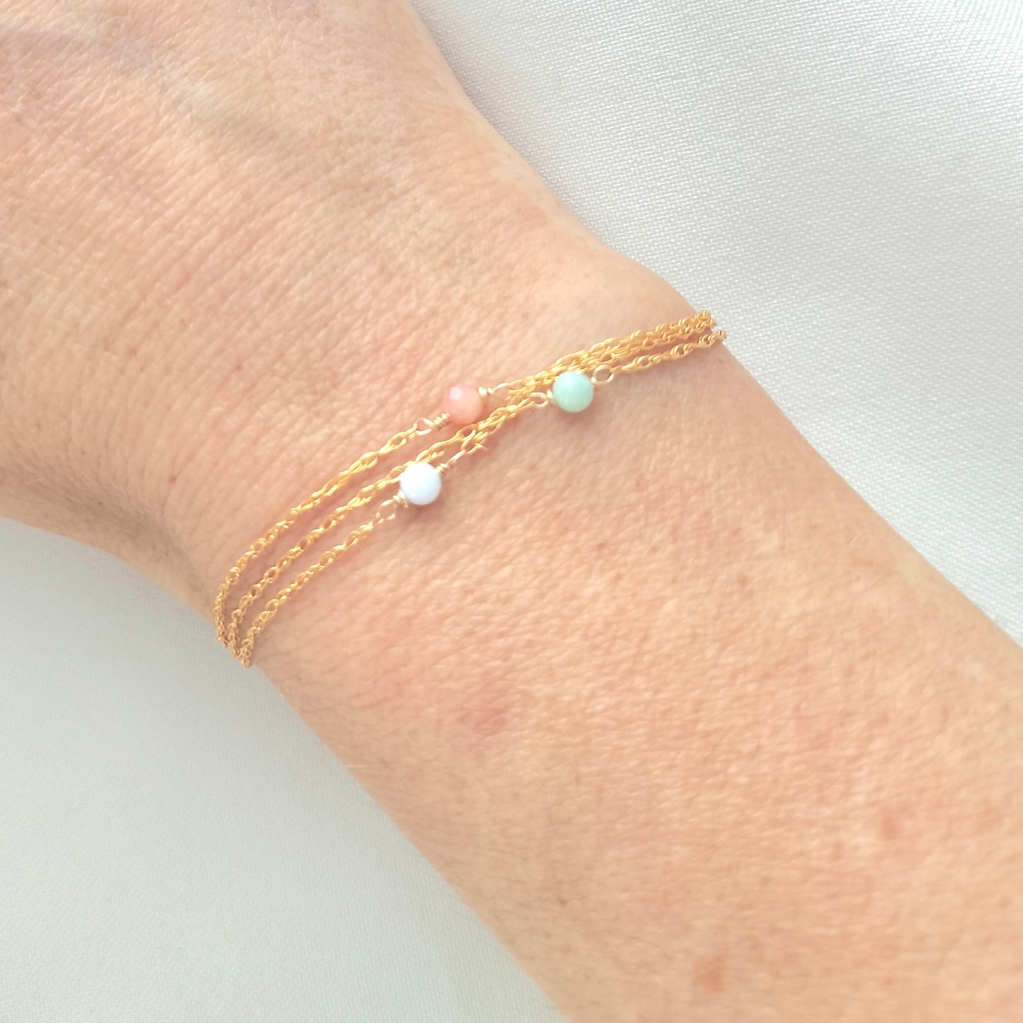 Triple strand pastel gemstone bracelet