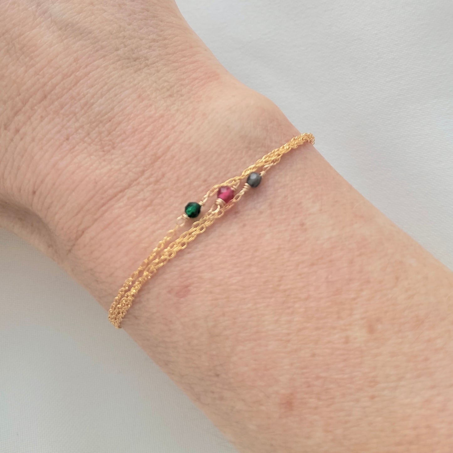 Triple strand jewel gemstone bracelet